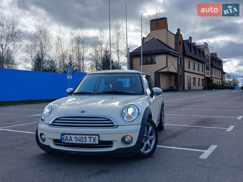 2007 Mini Cooper, VIN WMWME31050TL73596:plate — photo 1 (autoria)