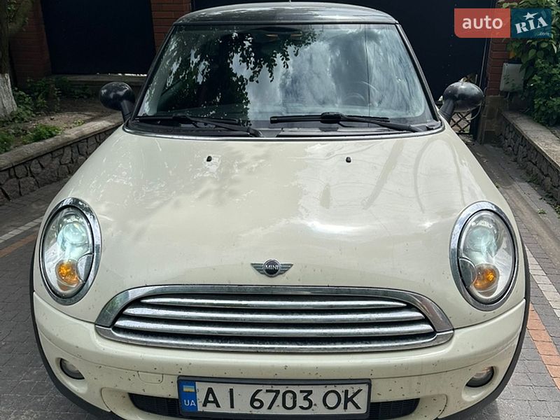 2008 Mini Cooper, VIN WMWMF31000TT79352:plate — фото 1 (autoria)