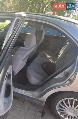 Лифтбек Mitsubishi Carisma 1998 в 