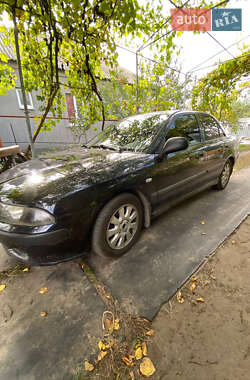 Седан Mitsubishi Carisma 2003 в  фото 10 Седан Mitsubishi Carisma 2003 в