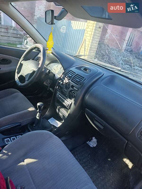 Седан Mitsubishi Carisma 1996 в Надворной фото 9 Седан Mitsubishi Carisma 1996 в Надворной