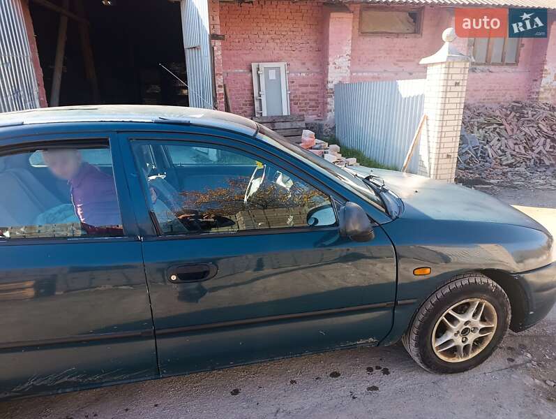 Седан Mitsubishi Carisma 1996 в Надворной фото 12 Седан Mitsubishi Carisma 1996 в Надворной