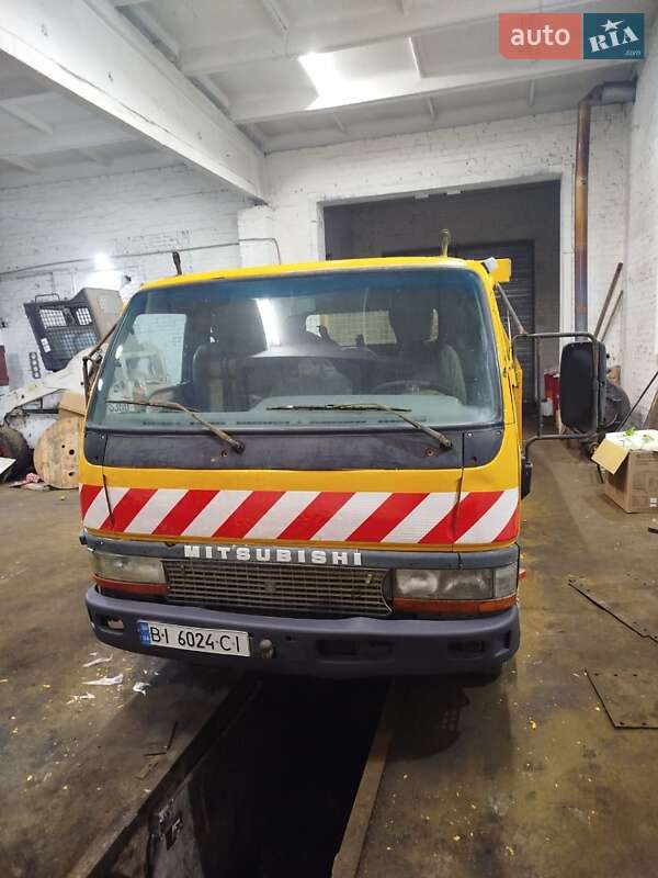 Евакуатор Mitsubishi Fuso Canter 2001 в Кременчуці фото Евакуатор Mitsubishi Fuso Canter 2001 в Кременчуці