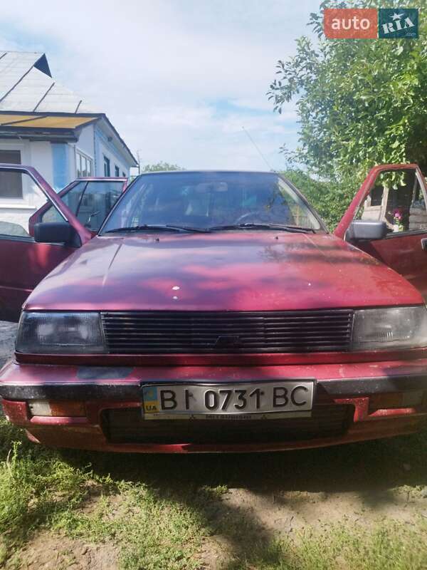 Седан Mitsubishi Lancer 1986 в Гадяче