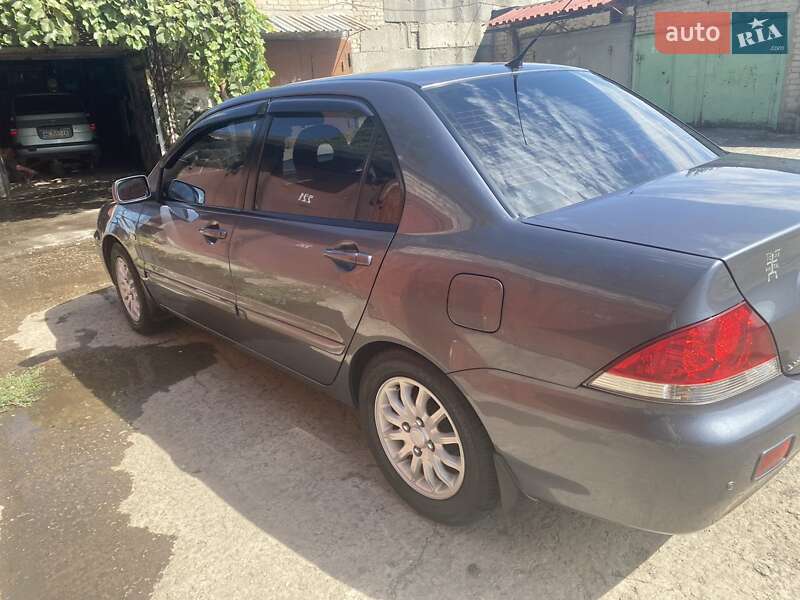 Седан Mitsubishi Lancer 2009 в Зеленодольской