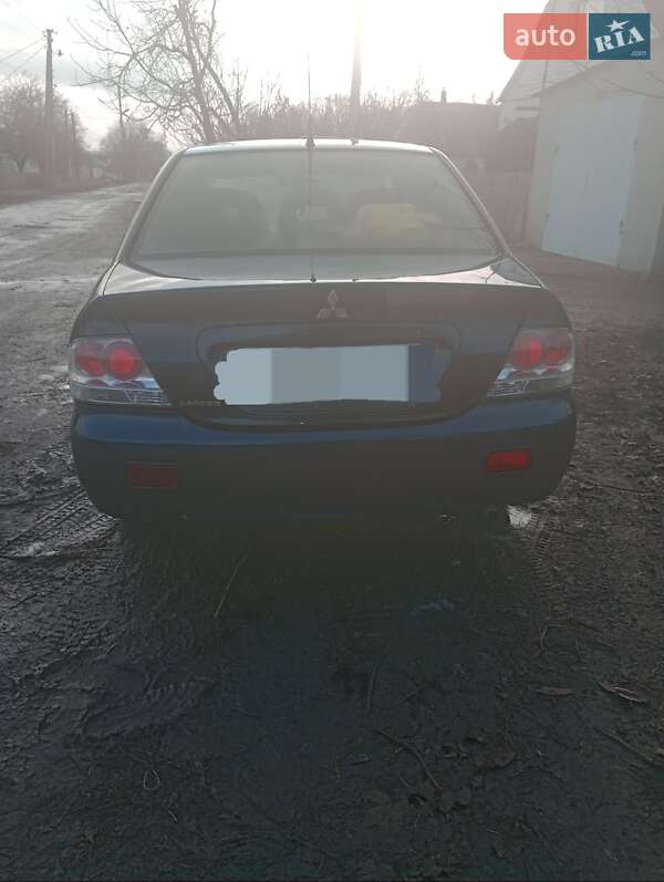 Седан Mitsubishi Lancer 2007 в Лозовой фото 13 Седан Mitsubishi Lancer 2007 в Лозовой