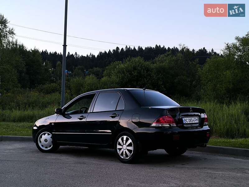 Седан Mitsubishi Lancer 2004 в Сходнице фото 11 Седан Mitsubishi Lancer 2004 в Сходнице