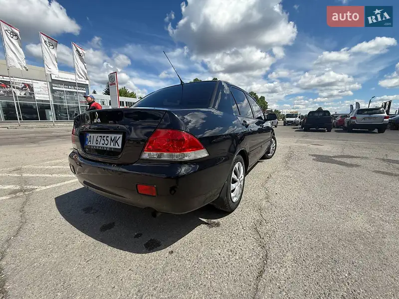 Mitsubishi Lancer 2008 VIN JMBSNCS3A8U000773 фото оголошення 7 з 50