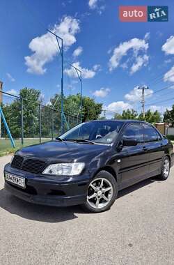 Седан Mitsubishi Lancer 2003 в Новых Петровцах