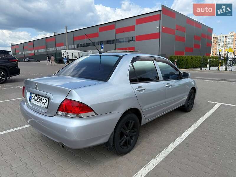 Седан Mitsubishi Lancer 2011 в Мене