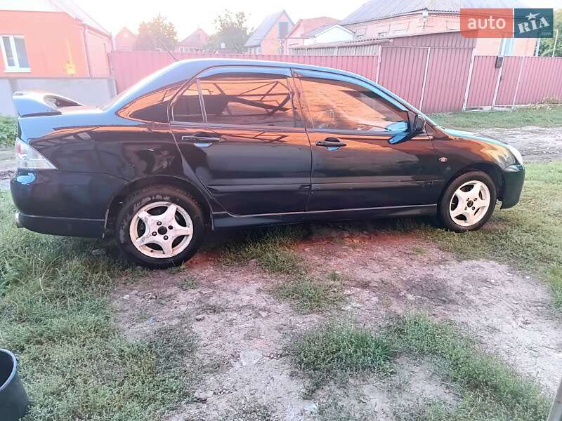 Седан Mitsubishi Lancer 2005 в Ромнах