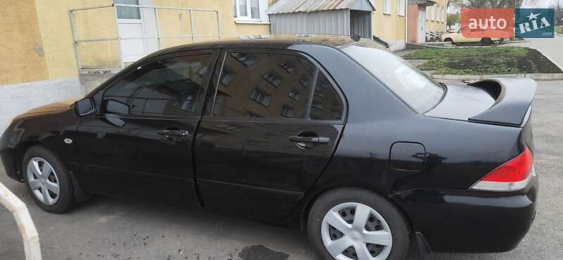 Седан Mitsubishi Lancer 2004 в Новгородці фото 10 Седан Mitsubishi Lancer 2004 в Новгородці