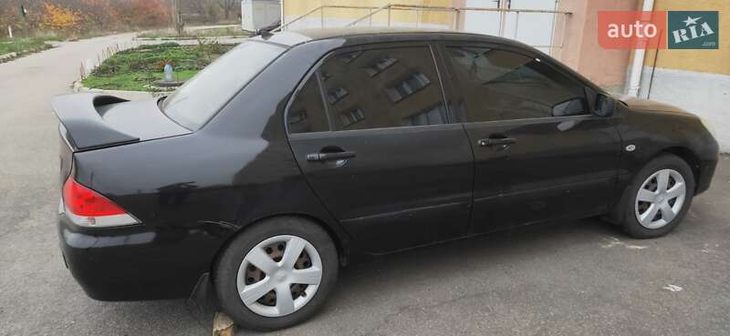 Седан Mitsubishi Lancer 2004 в Новгородці фото 13 Седан Mitsubishi Lancer 2004 в Новгородці