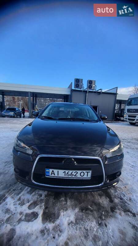 2009 Mitsubishi Lancer, VIN JMBLNCX3A9U004025:plate — фото 1 (autoria)