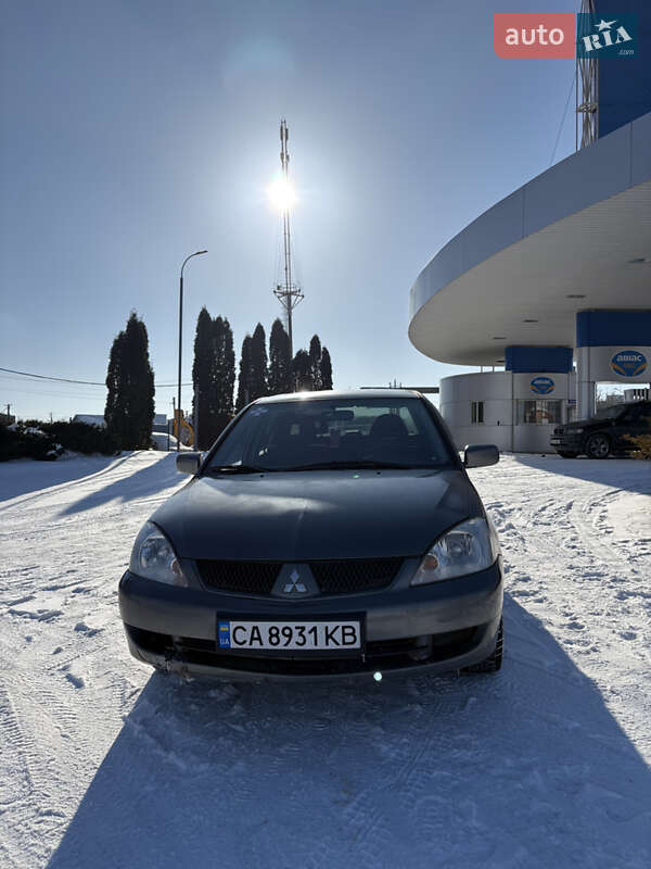2006 Mitsubishi Lancer, VIN JMBSNCS3A6U012509:plate — фото 1 (autoria)