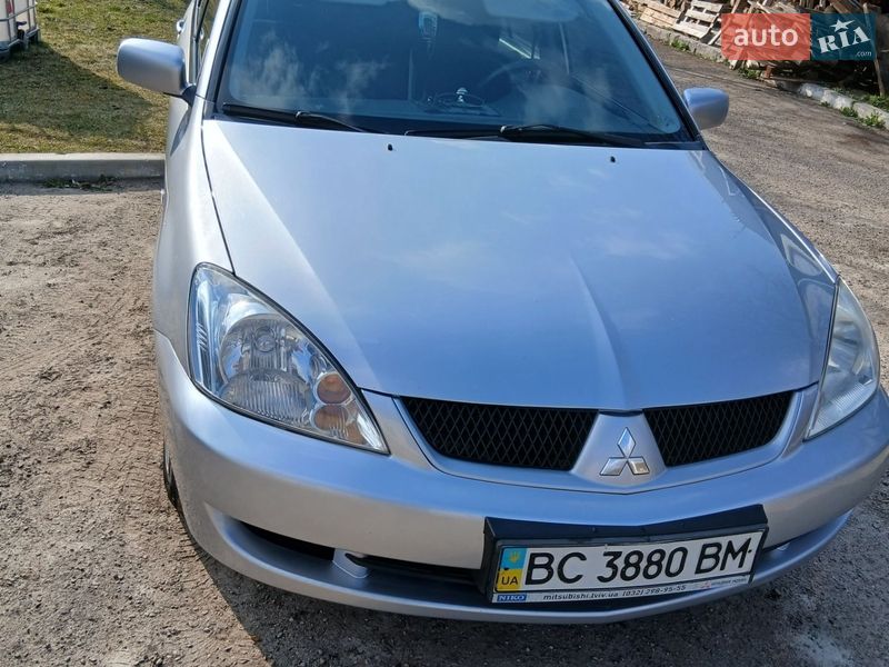 2008 Mitsubishi Lancer, VIN JMBSRCS3A8U011256:plate — фото 1 (autoria)