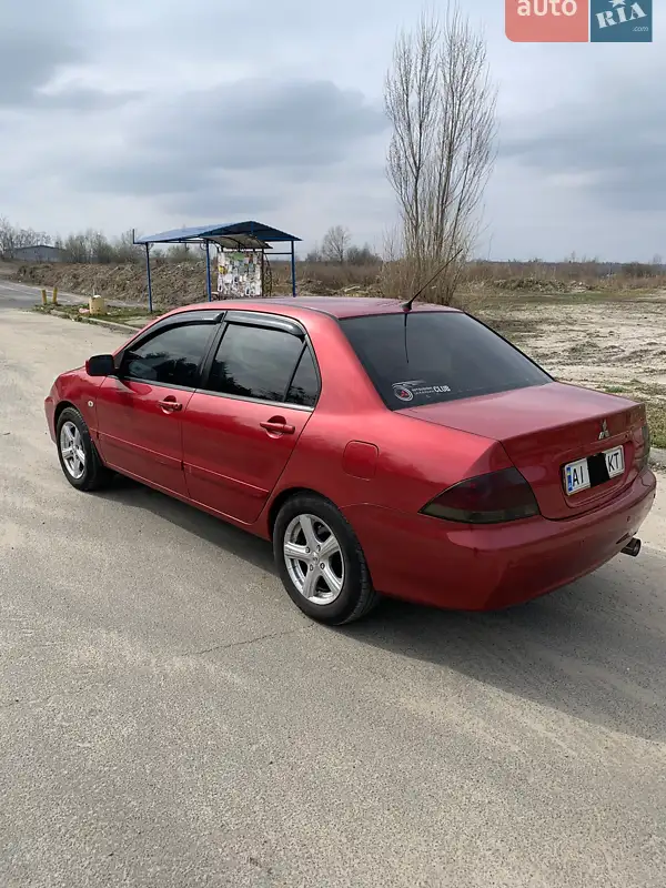 Mitsubishi Lancer 2009 VIN JMBSRCY2A9U004806 фото оголошення 20 з 46