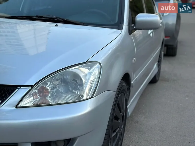 Mitsubishi Lancer 2009 VIN JMBSRCS3A9U000352 фото оголошення 2 з 41
