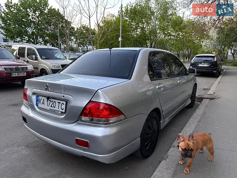 Mitsubishi Lancer 2009 VIN JMBSRCS3A9U000352 фото оголошення 5 з 41