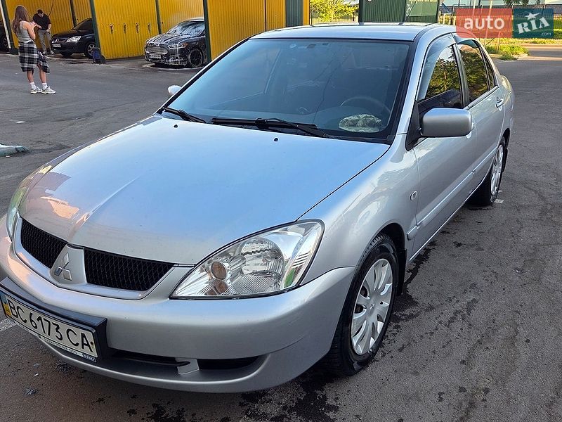 2009 Mitsubishi Lancer, VIN JMBSNCS3A9U000720:plate — фото 1 (autoria)