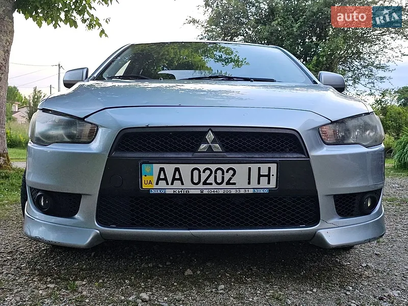Mitsubishi Lancer 2009 VIN JMBSRCY2A9U004806 фото оголошення 13 з 46