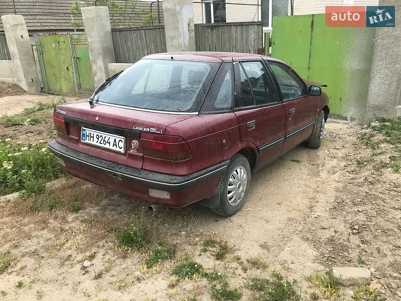 Mitsubishi Lancer, photos from the listing