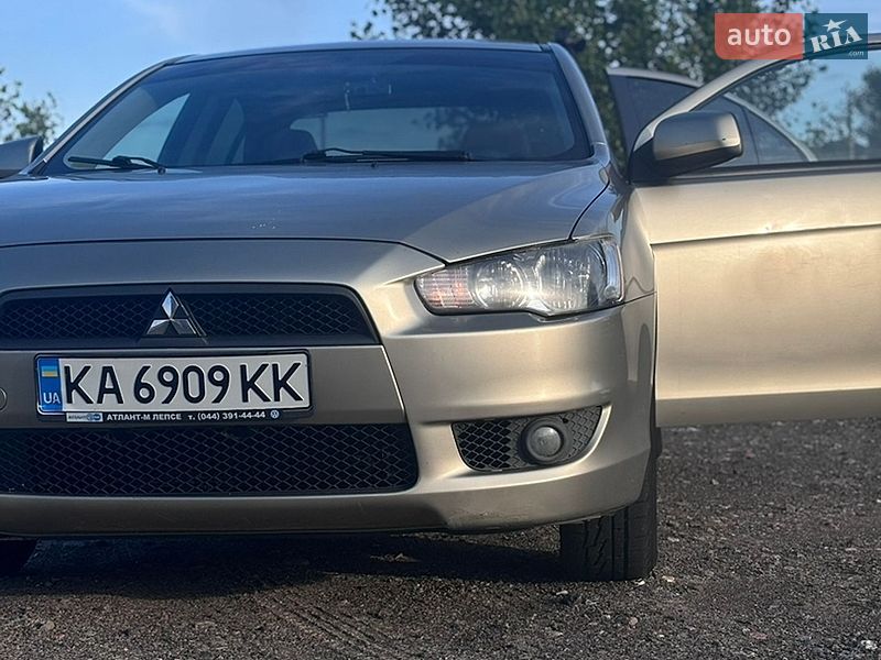 2009 Mitsubishi Lancer, VIN JMBSRCY2A9U004919:plate — фото 1 (autoria)