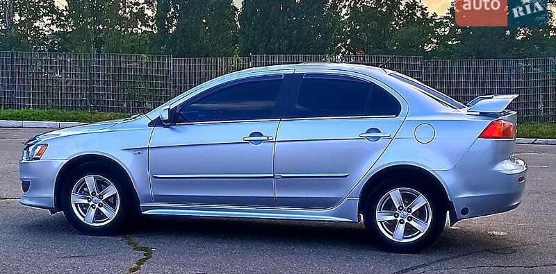 2008 Mitsubishi Lancer, VIN JMYSRCY2A8U001997:plate — фото 1 (autoria)