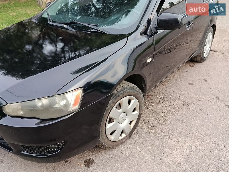 2008 Mitsubishi Lancer, VIN JMBSNCY2A8U017489:plate — фото 1 (autoria)