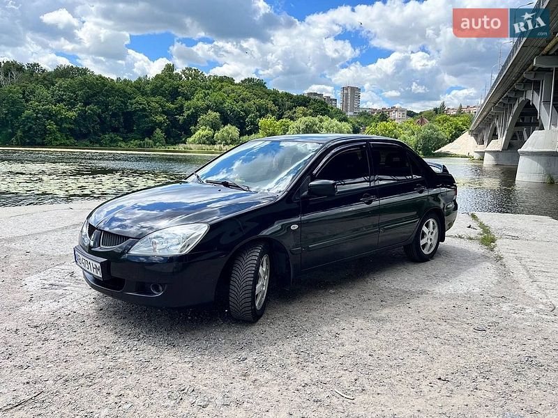 2005 Mitsubishi Lancer, VIN JMBSNCS3A5U006266:plate — фото 1 (autoria)