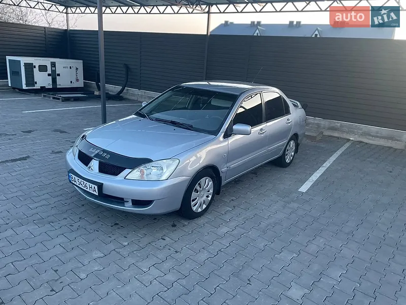Mitsubishi Lancer 2008 VIN JMBSRCS3A8U007457 фото оголошення 3 з 58