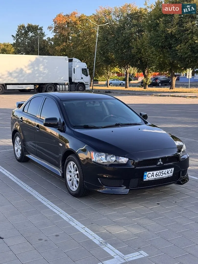 2013 Mitsubishi Lancer - фото 1