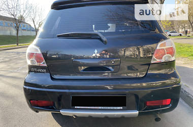 Позашляховик / Кросовер Mitsubishi Outlander Sport 2009 в 