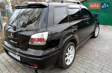 Внедорожник / Кроссовер Mitsubishi Outlander 2005 в 