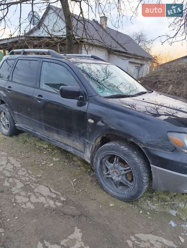 Внедорожник / Кроссовер Mitsubishi Outlander 2003 в Луцке фото 2 Внедорожник / Кроссовер Mitsubishi Outlander 2003 в Луцке