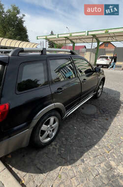 Внедорожник / Кроссовер Mitsubishi Outlander 2004 в 