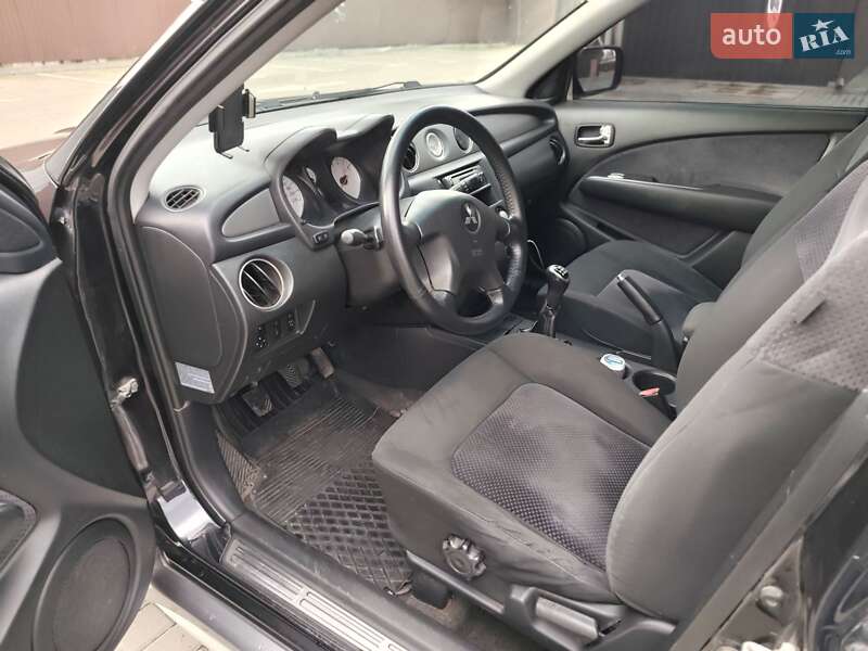 Внедорожник / Кроссовер Mitsubishi Outlander 2005 в Черкассах фото 11 Внедорожник / Кроссовер Mitsubishi Outlander 2005 в Черкассах