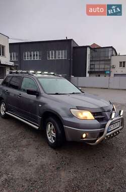 Внедорожник / Кроссовер Mitsubishi Outlander 2006 в  фото 10 Внедорожник / Кроссовер Mitsubishi Outlander 2006 в