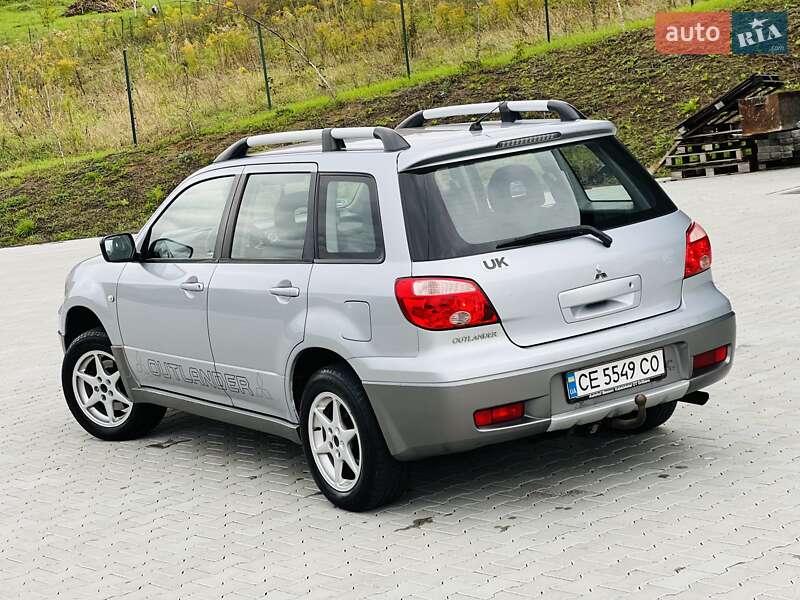 Позашляховик / Кросовер Mitsubishi Outlander 2006 в Чернівцях фото 10 Позашляховик / Кросовер Mitsubishi Outlander 2006 в Чернівцях