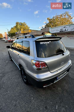 Внедорожник / Кроссовер Mitsubishi Outlander 2004 в  фото 11 Внедорожник / Кроссовер Mitsubishi Outlander 2004 в