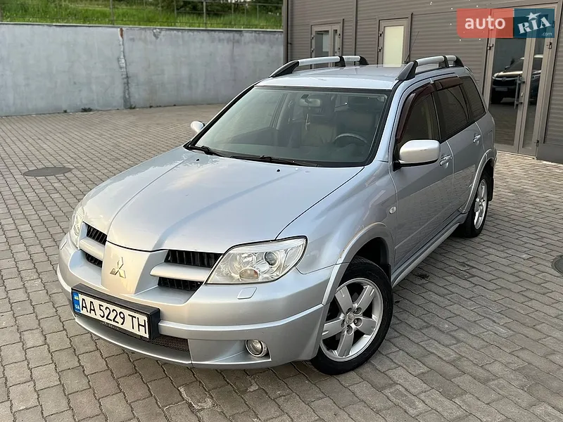 Mitsubishi Outlander 2006 VIN JMBXRCU5W7U000678 фото оголошення 2 з 153