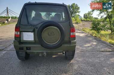 Внедорожник / Кроссовер Mitsubishi Pajero Pinin 1999 в 