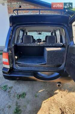 Внедорожник / Кроссовер Mitsubishi Pajero Pinin 1999 в 