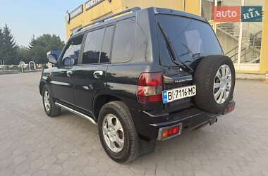 Внедорожник / Кроссовер Mitsubishi Pajero Pinin 2002 в 