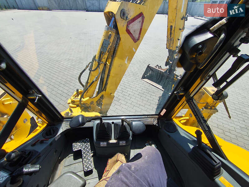Екскаватор навантажувач New Holland LB95B-4PT 2003 в Львові