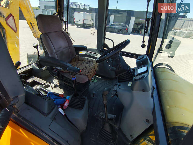 Екскаватор навантажувач New Holland LB95B-4PT 2003 в Львові