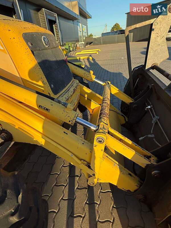 Екскаватор навантажувач New Holland LB95B-4PT 2003 в Львові