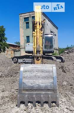 Гусеничный экскаватор New Holland LB 2007 в 