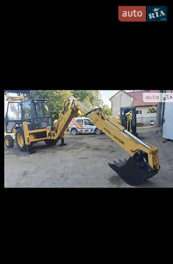 Экскаватор погрузчик New Holland LB 1995 в 