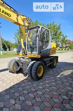 Колесный экскаватор New Holland MH 3.6 2009 в 